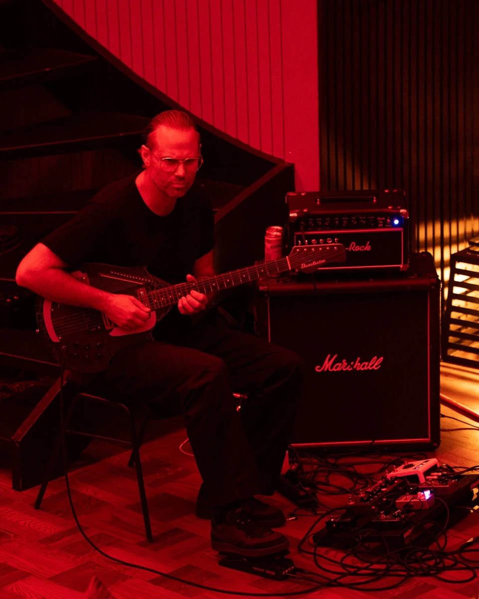 A guitarist performing during Sleep Event