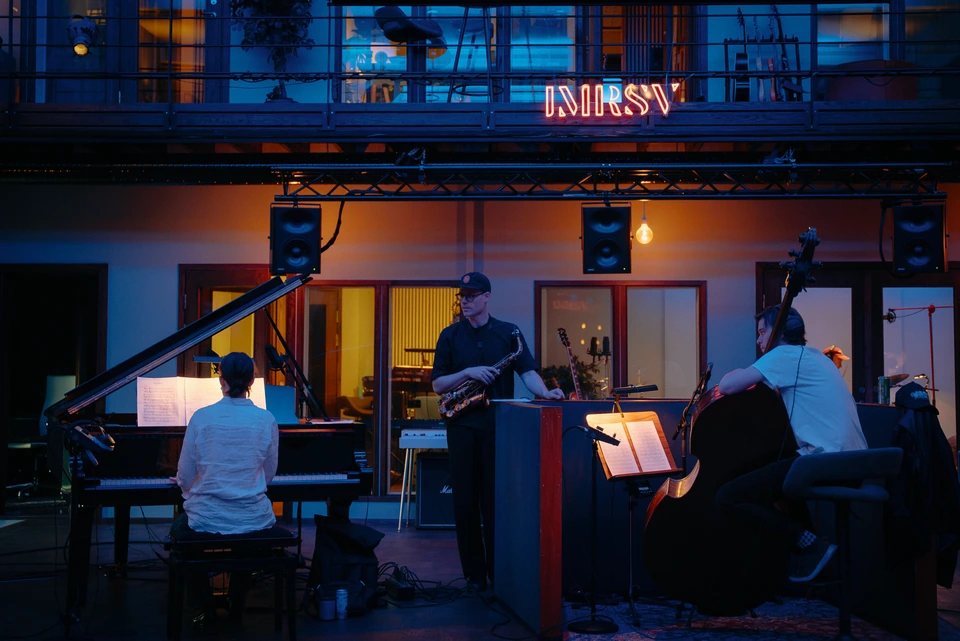 Musicians playing together in the live room