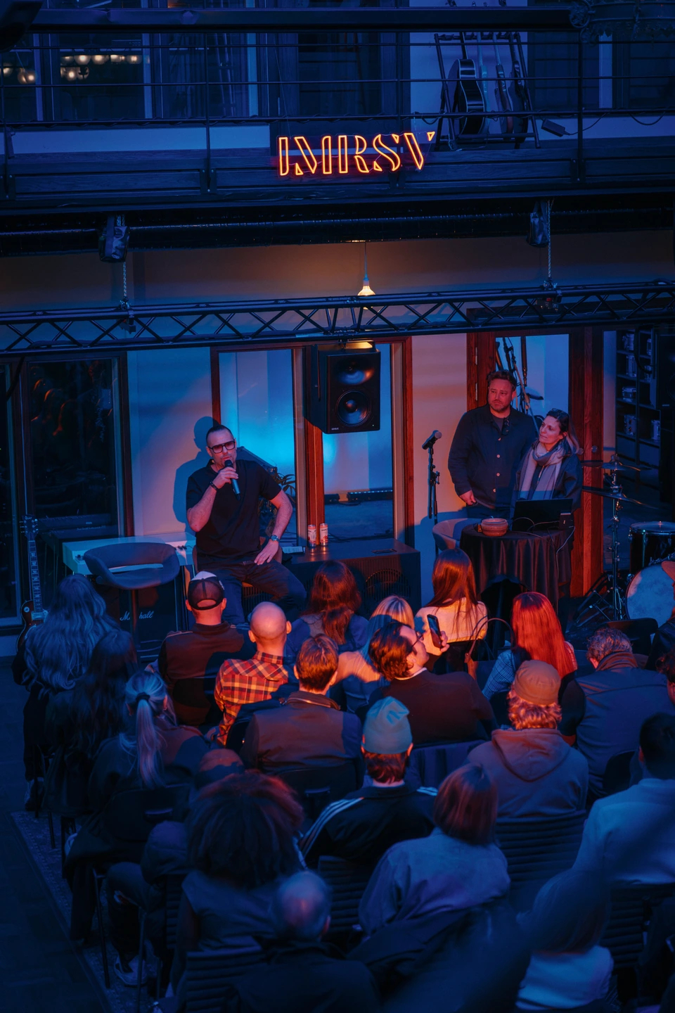 An intimate performance surrounded by the audience at IMRSV Events